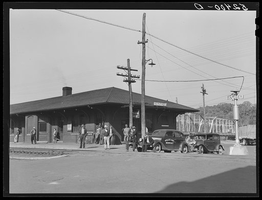 Untitled photo, possibly related to: Men hanging around station in Newport, Tennessee