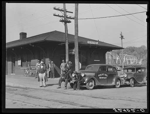Men hanging around station in Newport, Tennessee