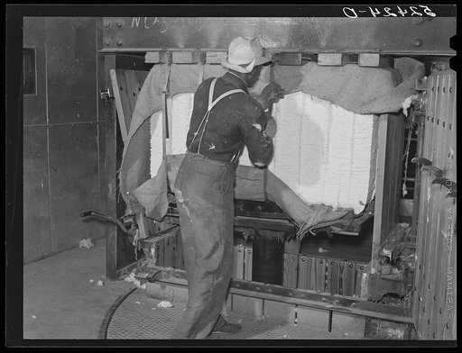 Baling the cotton in the gin. Hopson Plantation, Clarksdale, Mississippi