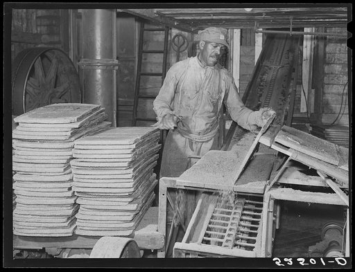 Cakes of cottonseed meal which is fed to cattle in oil plant. Clarksdale, Mississippi Delta
