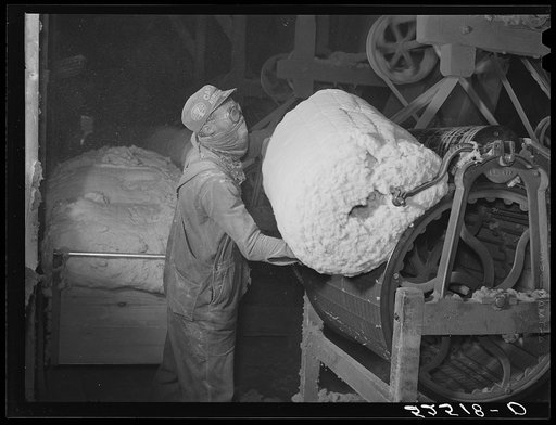 Untitled photo, possibly related to: Rolls of lint from the cottonseed used in making of ammunitions and various cellulose products. Oil plant, Clarksdale, Mississippi Delta