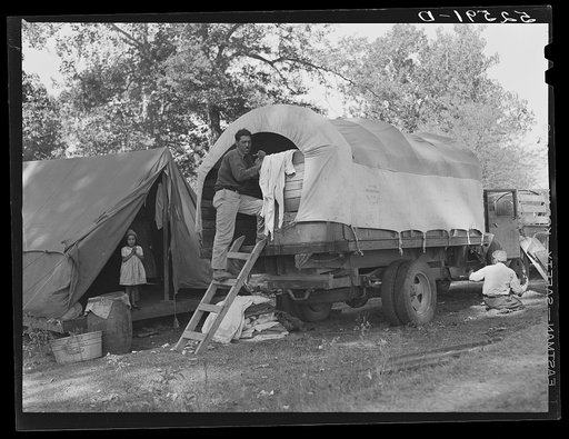 Mexican labor is brought in trucks by a contractor for the duration of the cotton picking season to the Mississippi Delta. This is on the Hopson Plantation