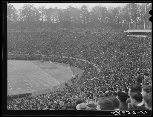 There was a crowd of 52,000 people in Duke University Stadium on day of Duke-Carolina football game. Durham, North Carolina