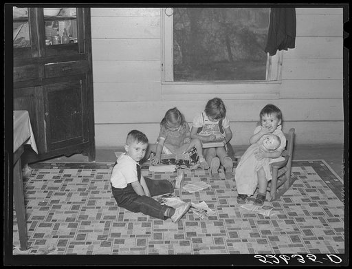 Untitled photo, possibly related to: Some of the Wilkins clan at dinner on corn-shucking day at home of Mrs. Fred Wilkins. Tallyho, near Stem, Granville County, North Carolina