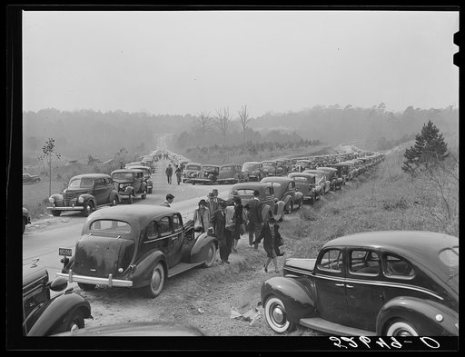 Cars parked along the highways on day of Duke-Carolina football game, near Duke University Stadium