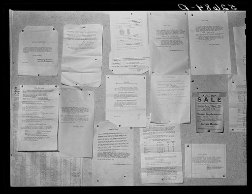 Bulletin board showing variety of notices: sales, wills, forclosures, game laws, hunting season, and etc. in hallway of Granville County Courthouse. Oxford, North Carolina