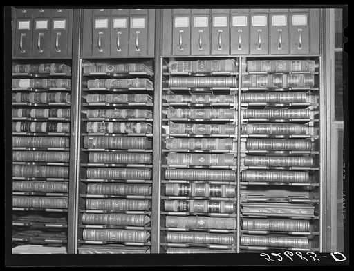 Files for documents and leather-bound books of records, deeds, etc. in the vault for records opening from clerk of court's office. Granville County Courthouse, Oxford, North Carolina
