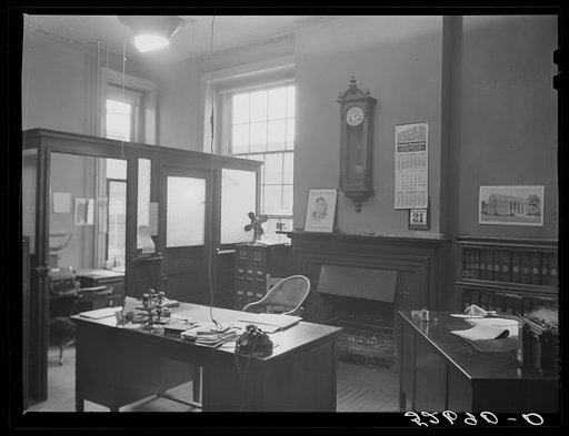 Clerk of court's office. Note the picture "Roosevelt a gallant leader" and of the proposed (now completed) building of the Institute of Government in Chapel Hill. Granville County Courthouse, Oxford, North Carolina