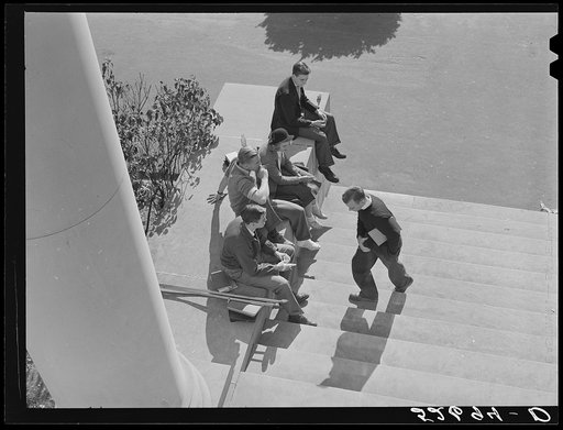 Untitled photo, possibly related to: Students on steps of building between classes. University of North Carolina, Chapel Hill, Orange County