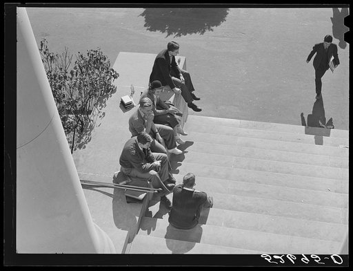 Untitled photo, possibly related to: Students on steps of building between classes. University of North Carolina, Chapel Hill, Orange County