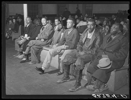 Spectators and witnesses on second day of Superior Court during trial of automobile accident case during court week in Granville County Courthouse, Oxford, North Carolina. See subregional notes (Odum) November 22, 1939