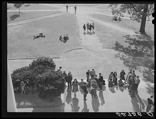 Students coming across campus during change of classes at University of North Carolina, Chapel Hill. Orange County, North Carolina