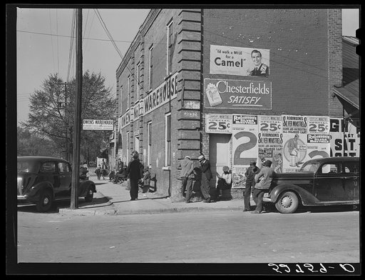 Tobacco warehouse during auction sales in Oxford. Granville County, North Carolina