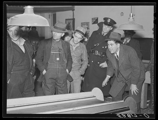 Farmers must often wait overnight or for several days before their tobacco is sold at auction. They sometimes hang around in cafes or pool rooms, sleeping most anywheres. Durham, North Carolina