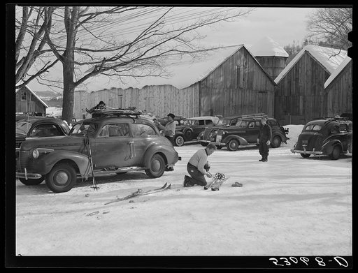 Every available space for parking is used by skiers on weekends at Clinton Gilbert's farm. The house is about eight years old; purchased by Gilbert in 1929. He has about 150 acres, mainly a dairy farm with twenty three cows. He also makes about one hundred gallons of maple syrup every year. First sk