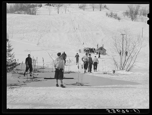 Every available space for parking is used by skiers on weekends at Clinton Gilbert's farm. The house is about eight years old; purchased by Gilbert in 1929. He has about 150 acres, mainly a dairy farm with twenty three cows. He also makes about one hundred gallons of maple syrup every year. First sk