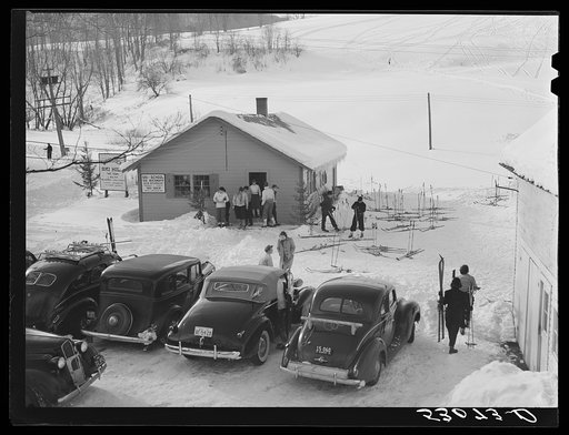 Untitled photo, possibly related to: Every available space for parking is used by skiers on weekends at Clinton Gilbert's farm. The house is about eight years old; purchased by Gilbert in 1929. He has about 150 acres, mainly a dairy farm with twenty three cows. He also makes about one hundred gallon