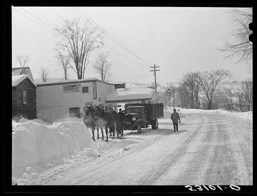 Horses hauling frozen truck to gas station. Woodstock, Vermont