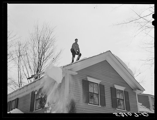 Untitled photo, possibly related to: Shoveling heavy snow off roof of house in Woodstock, Vermont