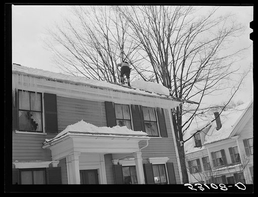 Untitled photo, possibly related to: Shoveling heavy snow off roof of house in Woodstock, Vermont