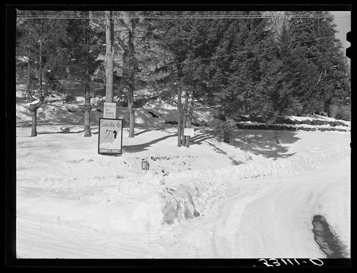 Crossroads showing signs to ski slopes in Woodstock, Vermont