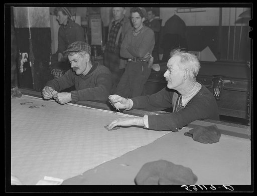 Proprietor of pool room and one of townspeople playing cards on a winter morning. Woodstock, Vermont