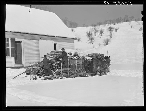 Untitled photo, possibly related to: Sawing wood on farm. Woodstock, Vermont
