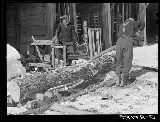 Sawing wood on farm. Woodstock, Vermont