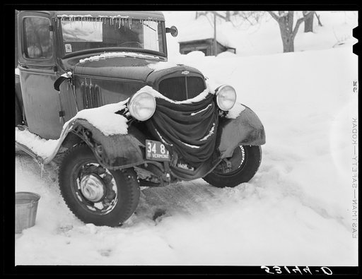 Many farmers blanket their cars and let water out of radiators to prevent freezing in winter. Woodstock, Vermont