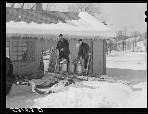 Untitled photo, possibly related to: Hauling water in milk cans after pipes have frozen. Clinton Gilbert's farm, Woodstock, Vermont