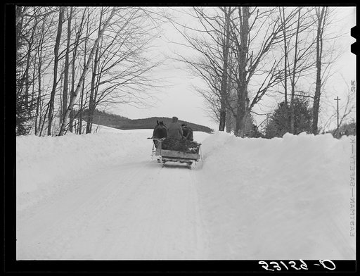 Untitled photo, possibly related to: Hauling water in milk cans after pipes have frozen. Putney farm, Woodstock, Vermont