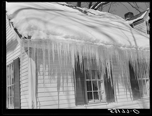 Icicles hanging from roof of house in Woodstock, Vermont