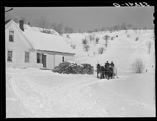 Clinton Gilbert, farmer, and his helper hauling wood in sled. Woodstock, Vermont