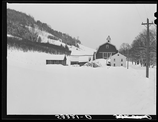 Untitled photo, possibly related to: Woodstock, Vermont. Deepest snow in years piled up beside highways and sidewalks on main street