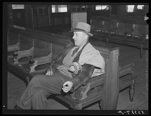 Postmaster waiting for train to arrive. Railway station, Mount Whittier, New Hampshire