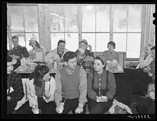 Untitled photo, possibly related to: Skiers eating lunch in tollhouse at foot of Mount Mansfield. Smugglers Notch. Near Stowe, Vermont