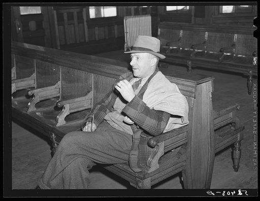 Untitled photo, possibly related to: Postmaster waiting for train to arrive. Railway station, Mount Whittier, New Hampshire