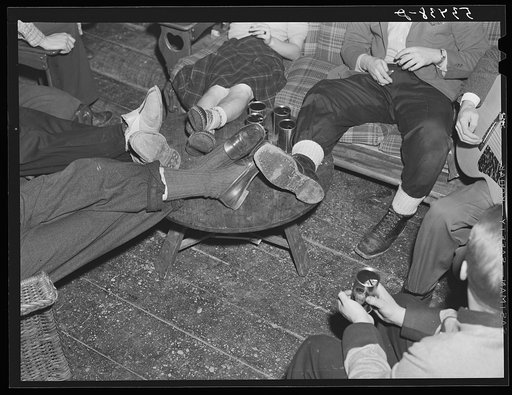 Skiers relaxing in lodge living room at North Conway, New Hampshire