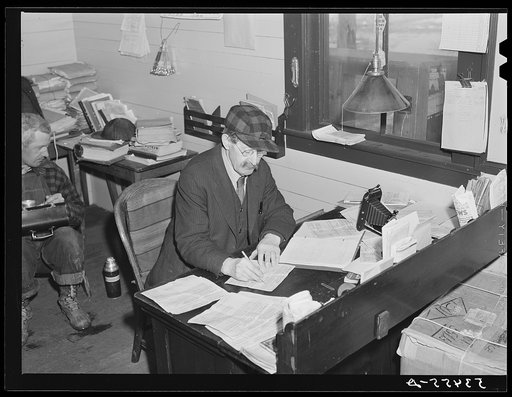 Baggage room agent in railway station. Mount Whittier, New Hampshire