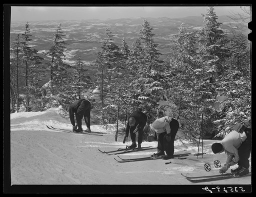 Skiers on top of Cannon Mountain. Franconia Notch, New Hampshire