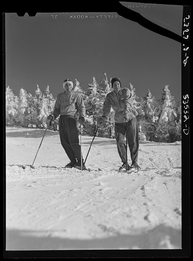 Skiers on top of Cannon Mountain. Franconia Notch, New Hampshire