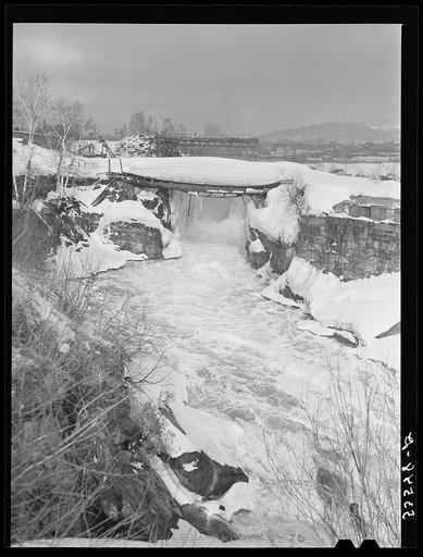 Bridge weighted down by heavy snowfall in Berlin, New Hampshire
