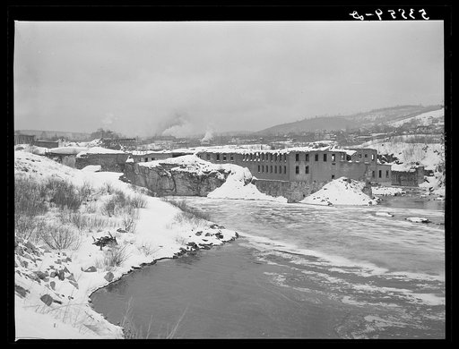 Old mill dynamited to avoid taxes after it was shut down about 1930. Berlin, New Hampshire, paper mill town inhabited largely by French-Canadians and Scandinavians