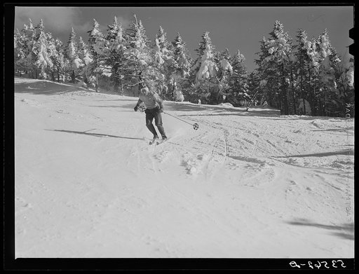 Skier on top of Cannon Mountain. Franconia Notch, New Hampshire