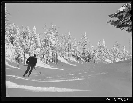 Skier on top of Cannon Mountain. Franconia Notch, New Hampshire