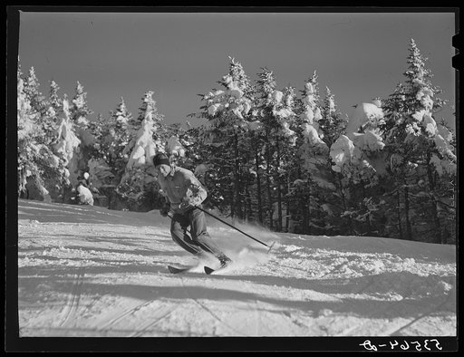 Skiers on top of Cannon Mountain. Franconia Notch, New Hampshire