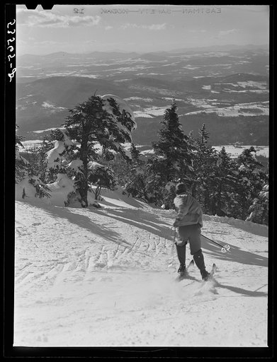 Skier on top of Cannon Mountain. Franconia Notch, New Hampshire