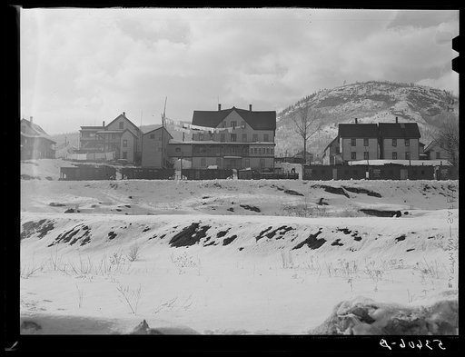 Freight cars in back of houses in Berlin, New Hampshire