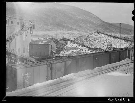 Untitled photo, possibly related to: Farmhouse and milk cans near Saint Johnsbury, Vermont
