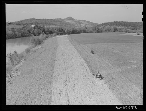 Planting corn along river in northeastern Tennessee